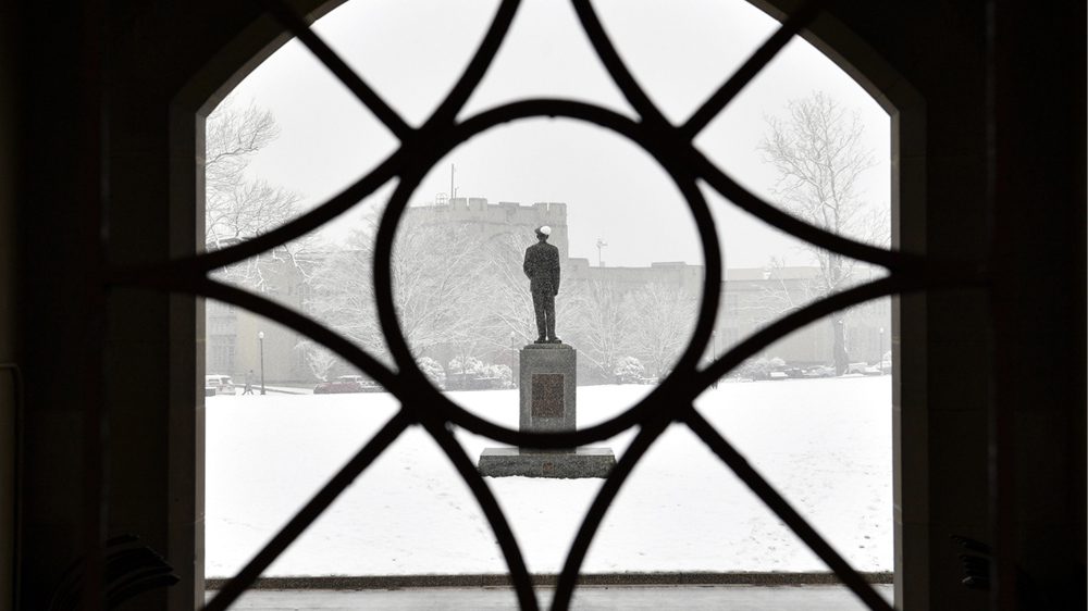 snowy Marshall statue from window opening in new barracks